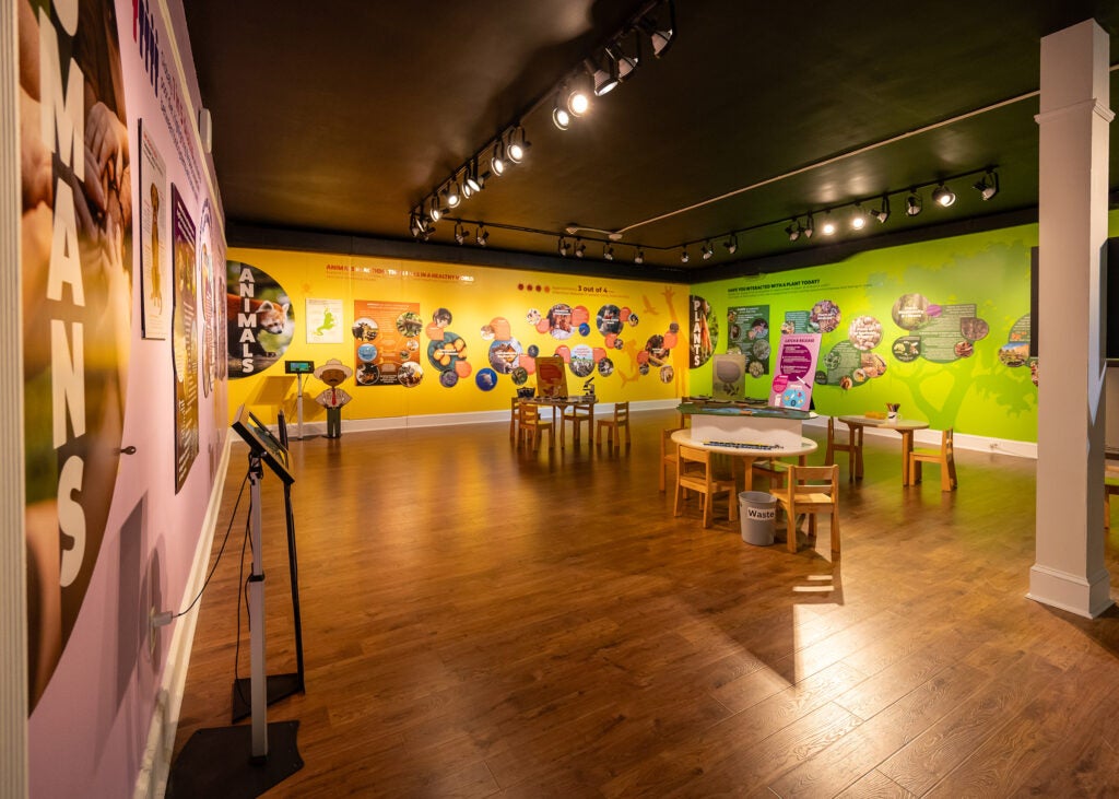 Exhibit hall containing One Health displays
