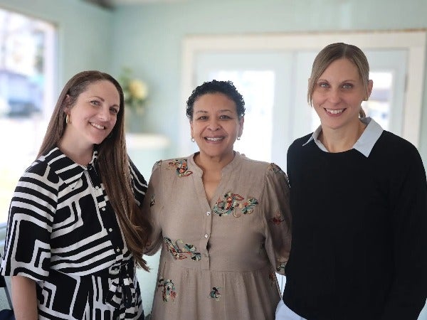 Three people from the IHLA projects team.
