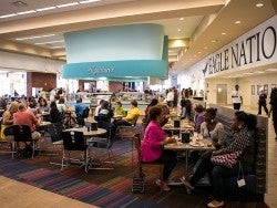 People eating lunch in the main dining area.
