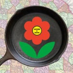 The Gather and Grow logo with a frying pan and a state map.