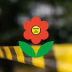 The Gather and Grow logo with police tape in the background.