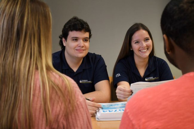 Parker College of Business students in the Volunteer Income Tax Assistance program help prepare and explain income tax information to clients.