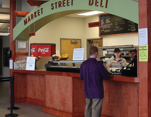 A student purchases a meal at the Market Street Deli.