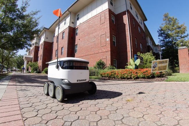The Starship robots have six wheels and are about the size of a cooler.