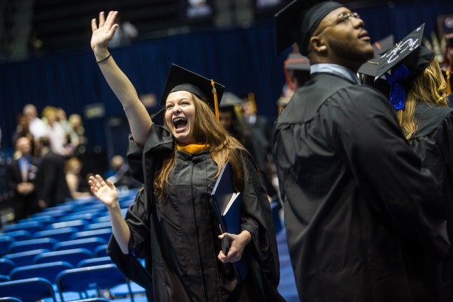girl waving
