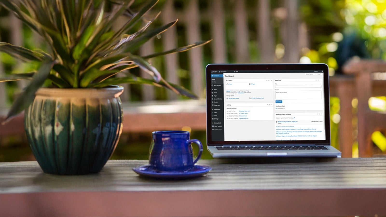 Laptop sitting on a desk showing the WordPress environment.