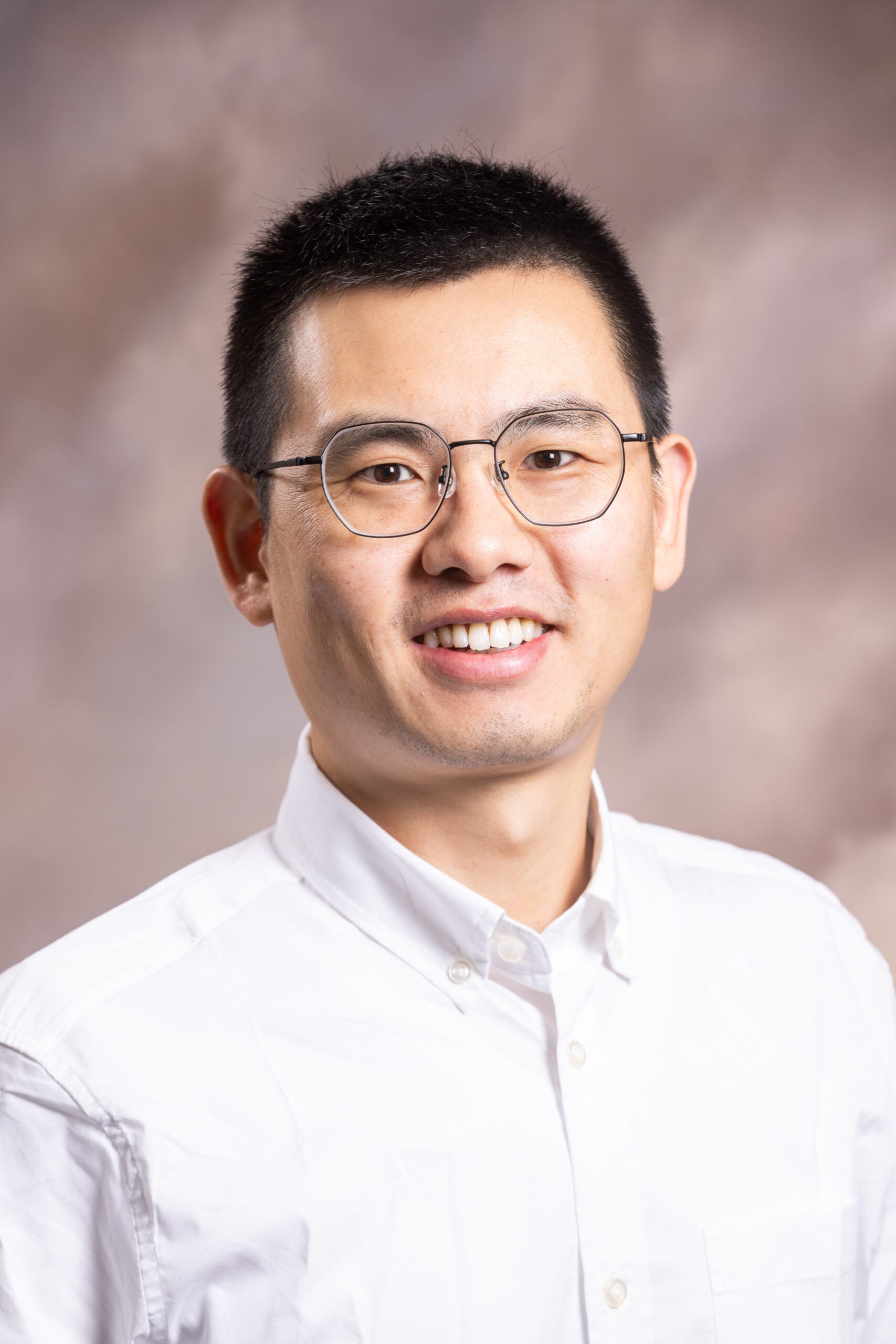 Portrait of Dr. Jianzhou He