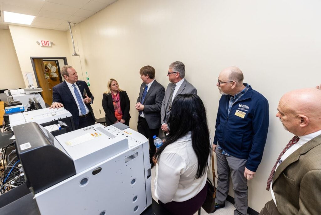 Georgia Southern and Shimadzu leaders tour a campus laboratory.