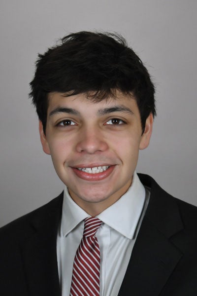 Headshot of Eliezer Clark