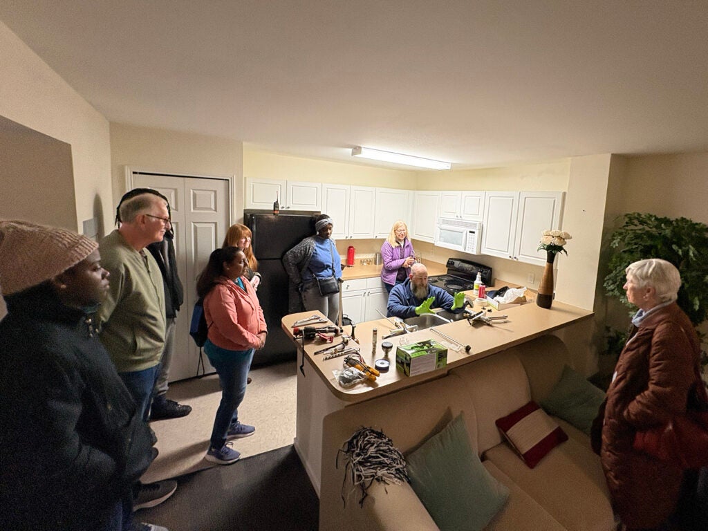 Handy Homeowner series participants learn from a facilities employee.