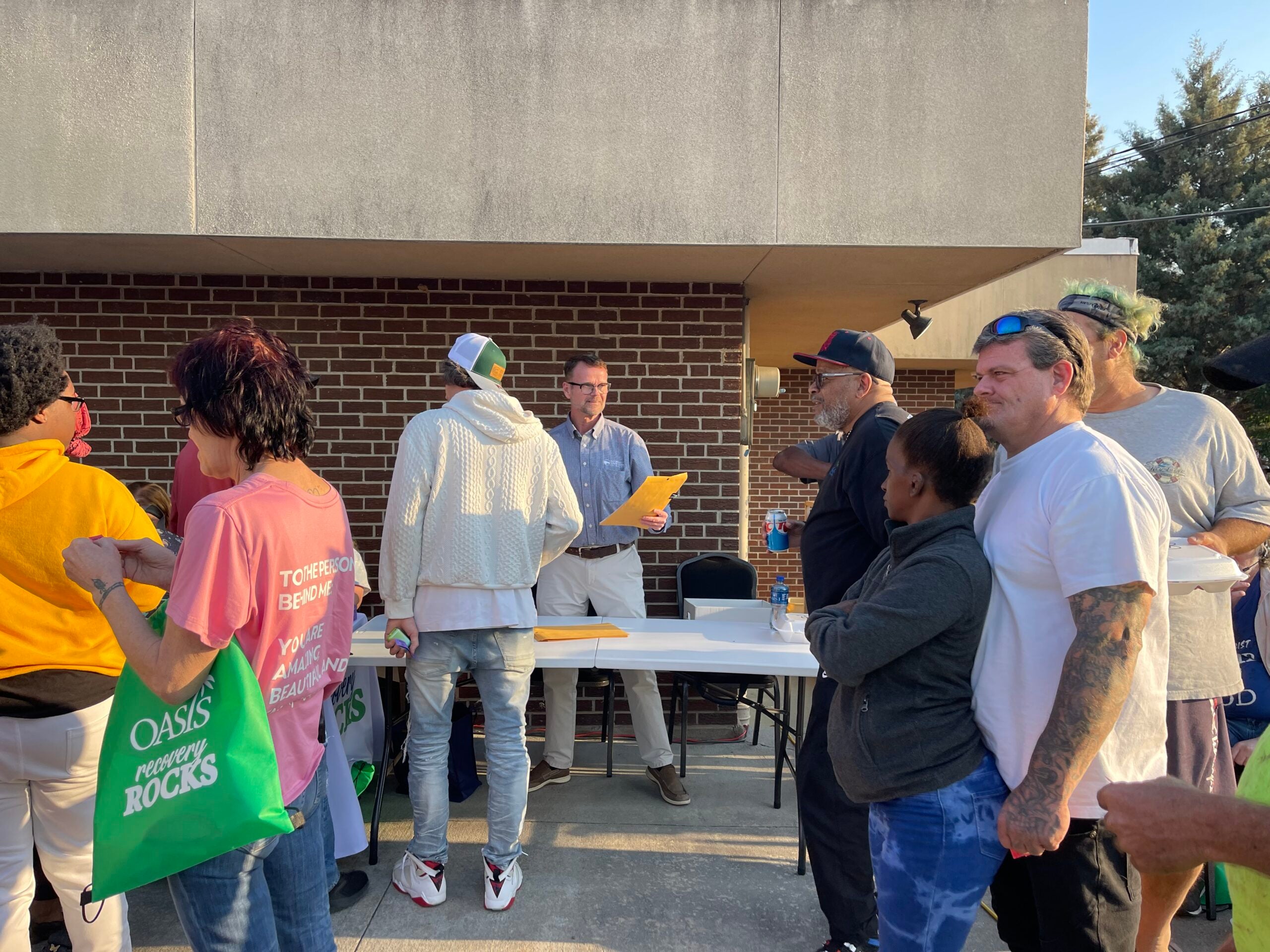 Dr. Mase distributing surveys in a rural area for needs assessment