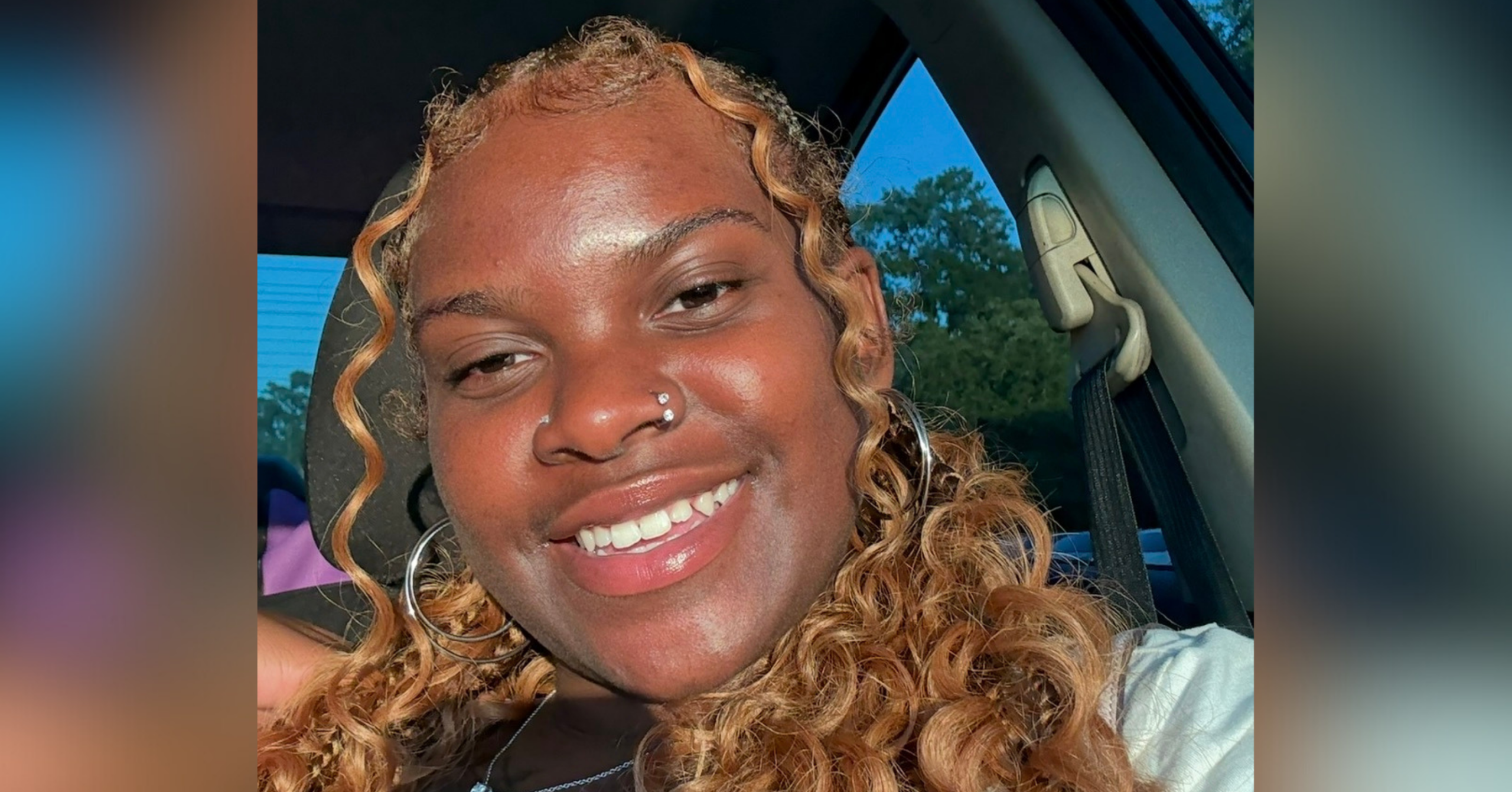 Radiation therapy student Ariyana Braxton poses for a selfie in the sunlight with a warm smile